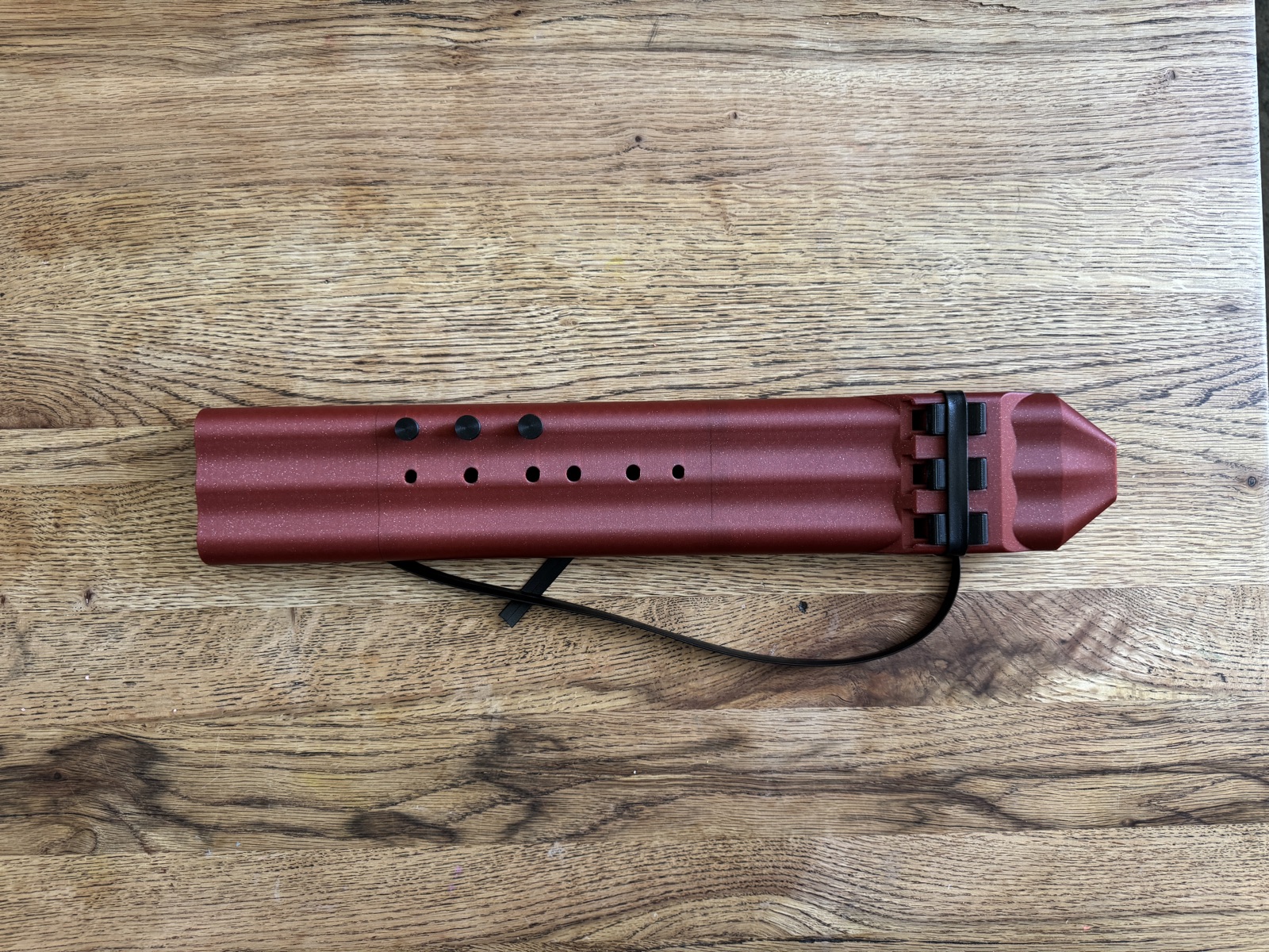 Full top view of the crimson triple drone flute
